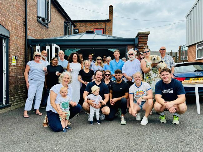 Bond Fitness members and coaches gathered together outside the gym